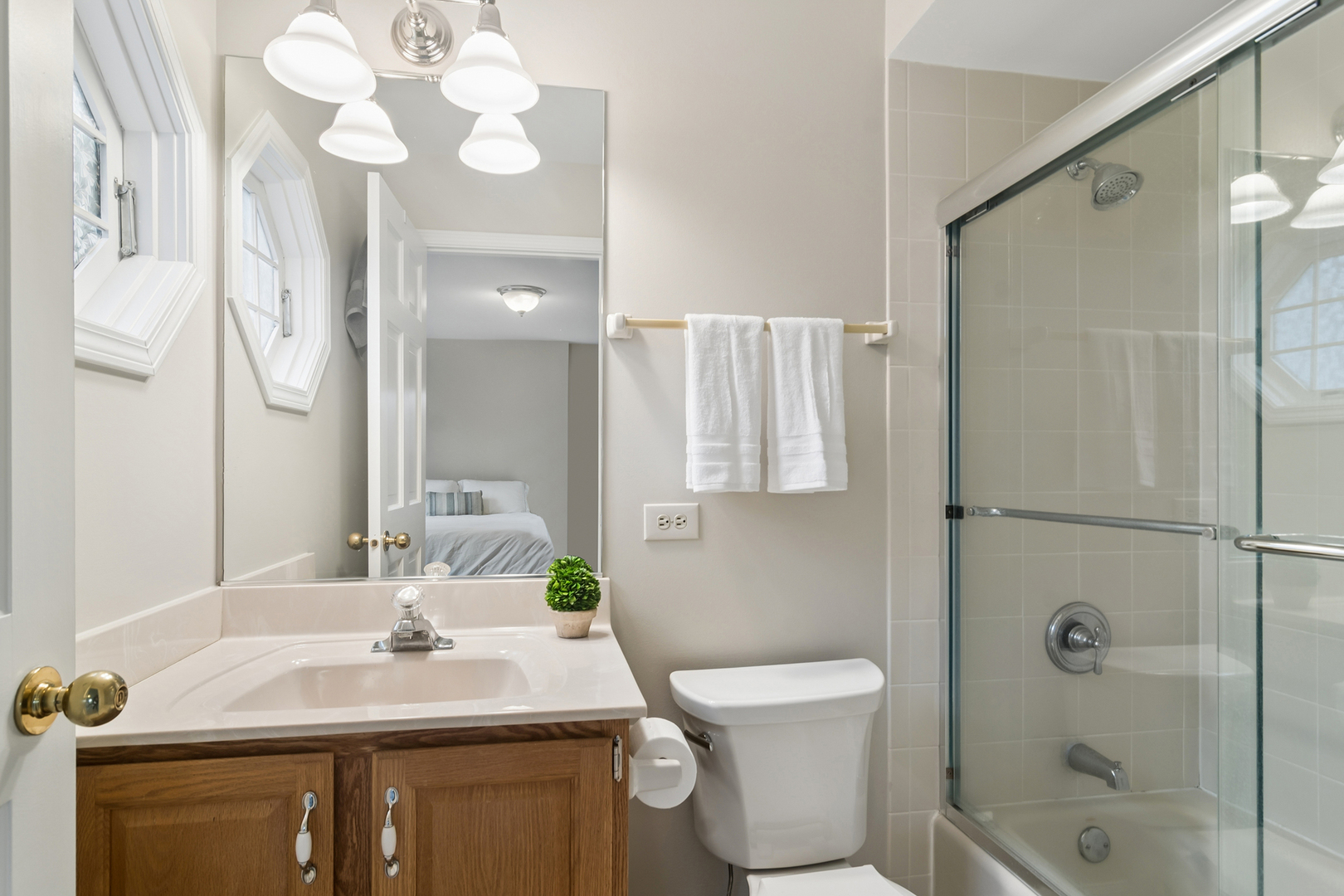 23466 West Redwing Place Barrington, IL 60010 - Photo 28 of 35 a bathroom with a sink a toilet and shower