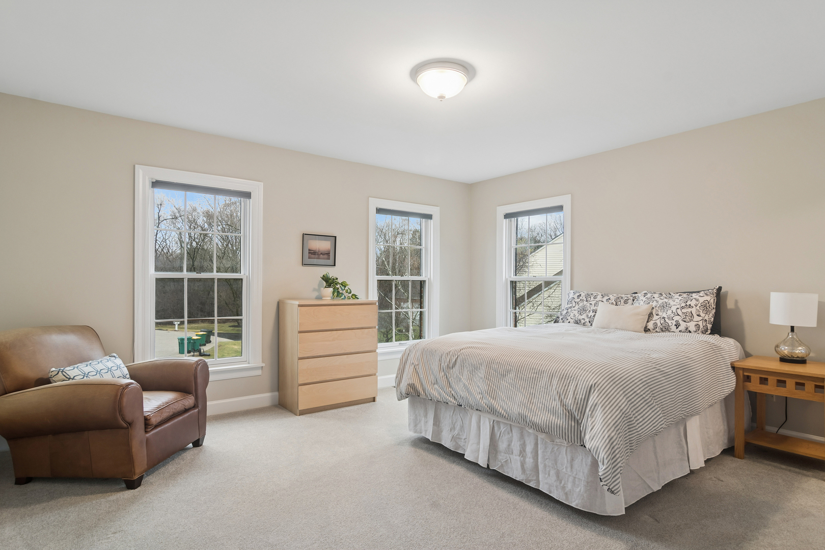 23466 West Redwing Place Barrington, IL 60010 - Photo 29 of 35 a bedroom with a bed and a couch
