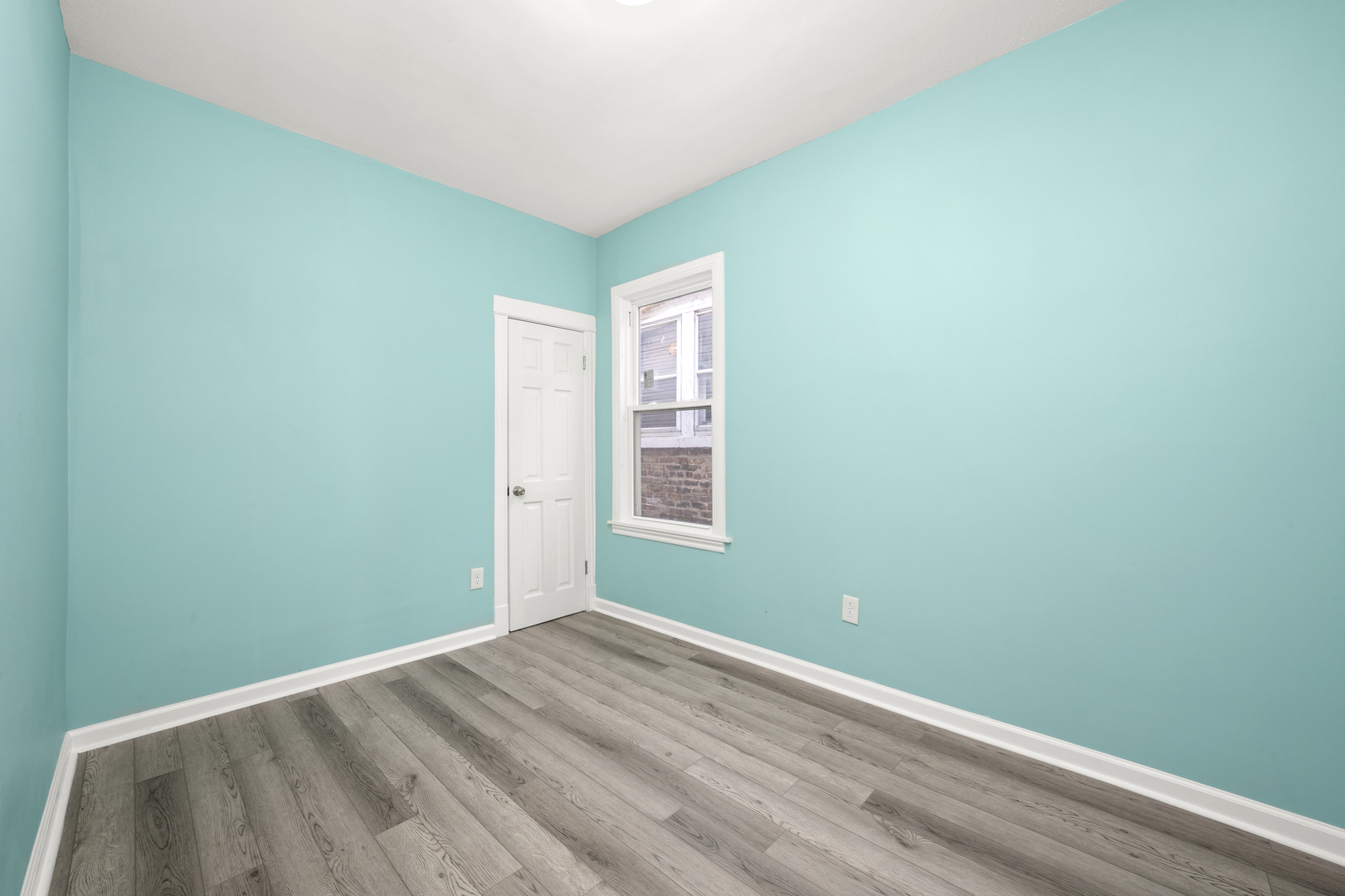 7128 South May Street Chicago, IL 60621 - Photo 11 of 32 a view of a room with window