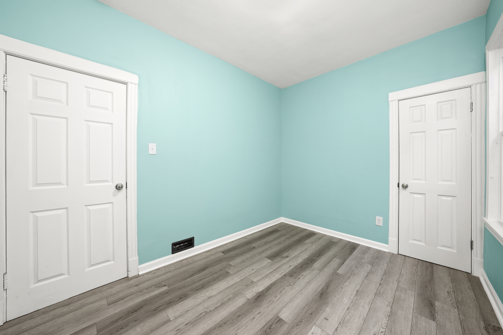 7128 South May Street Chicago, IL 60621 - Photo 14 of 32 wooden floor in an empty room