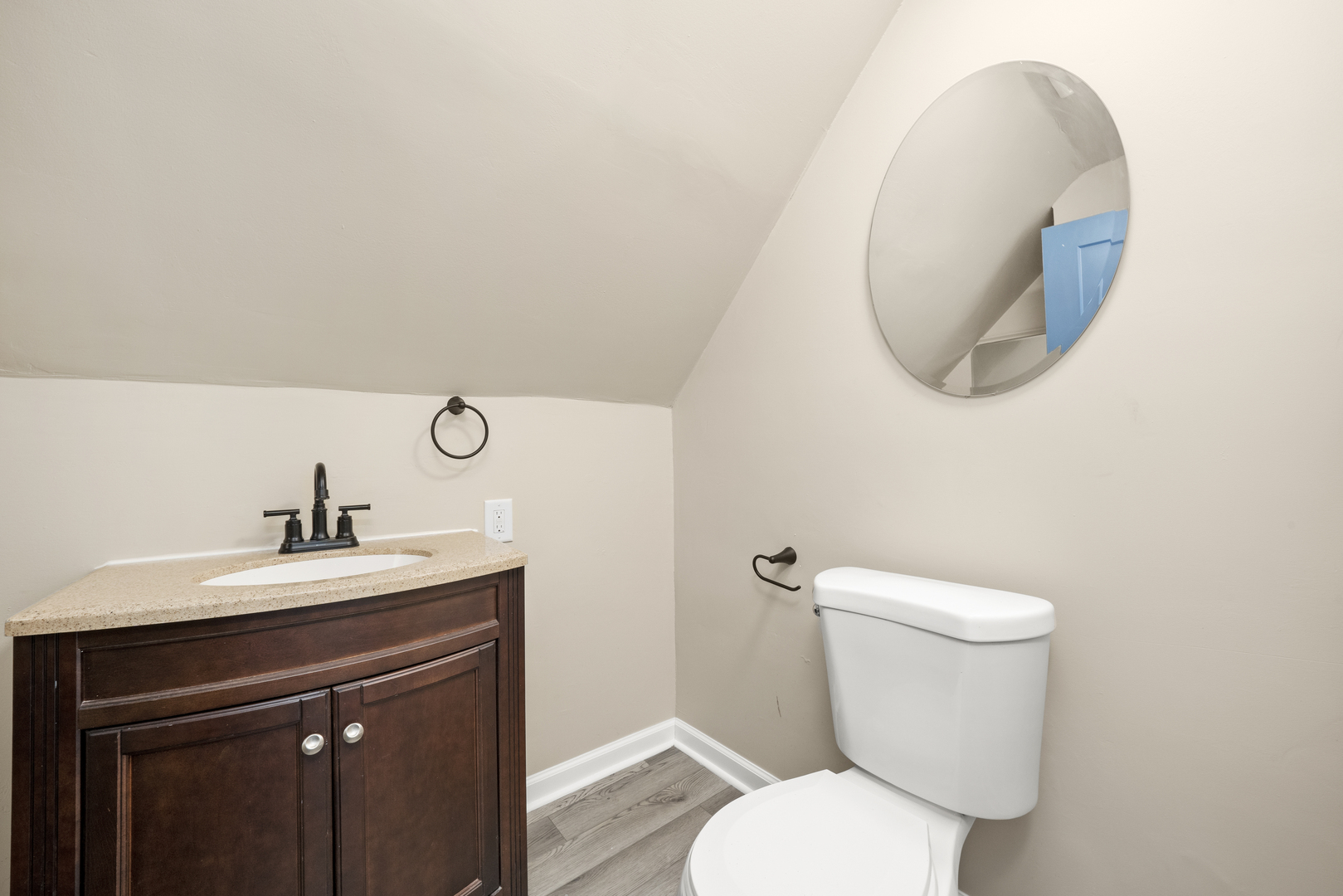 7128 South May Street Chicago, IL 60621 - Photo 23 of 32 a bathroom with a toilet and a sink