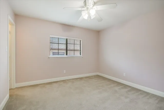 a front view of house with yard and outdoor seating