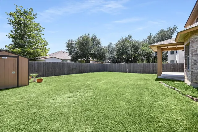 a house view with a garden space