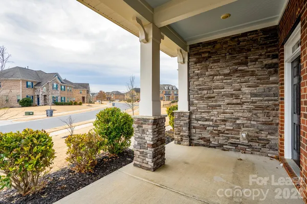 a view of a street with a building in the background