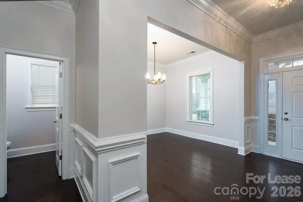 a view of livingroom with hardwood floor and hallway