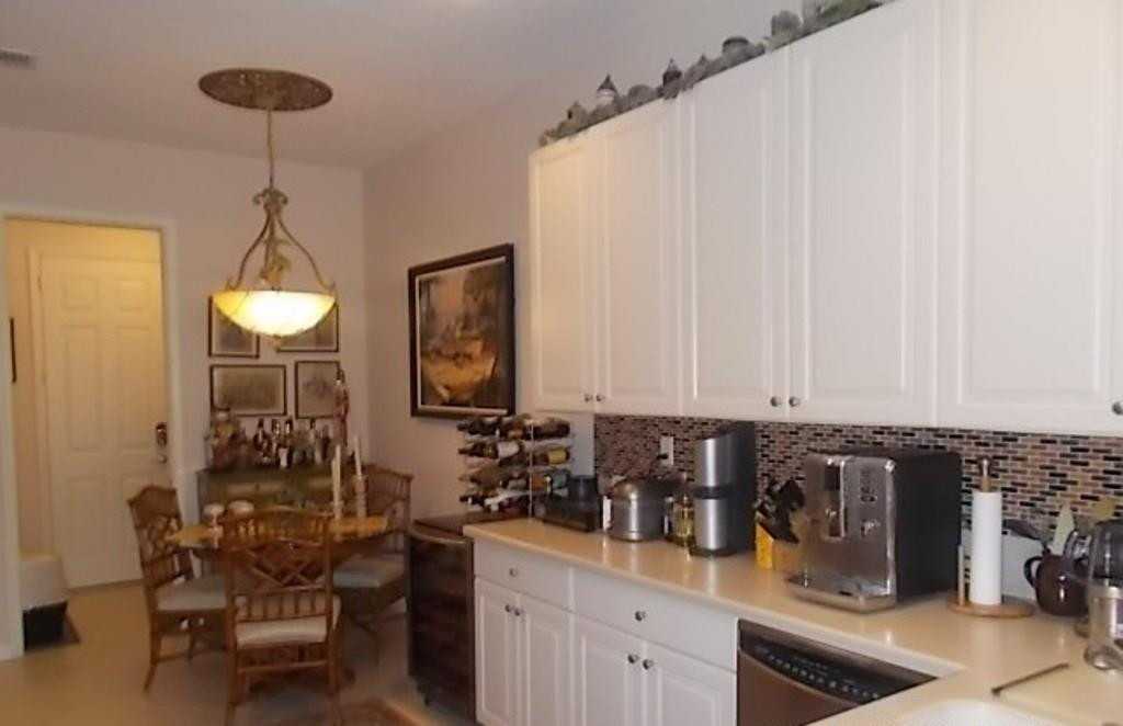370 Southwest Walking Path, Unit 370 Stuart, FL 34997 - Photo 12 of 38 kitchen with tile back splash
