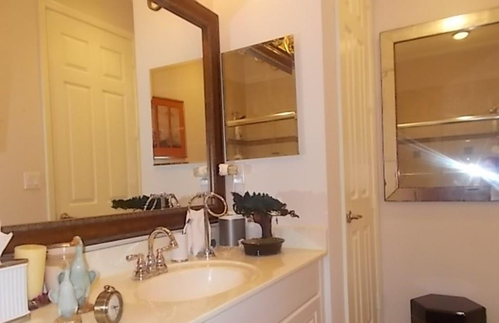 370 Southwest Walking Path, Unit 370 Stuart, FL 34997 - Photo 31 of 38 Upstairs hall bath with a linen closet