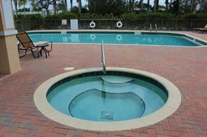 370 Southwest Walking Path, Unit 370 Stuart, FL 34997 - Photo 33 of 38 Community spa and pool