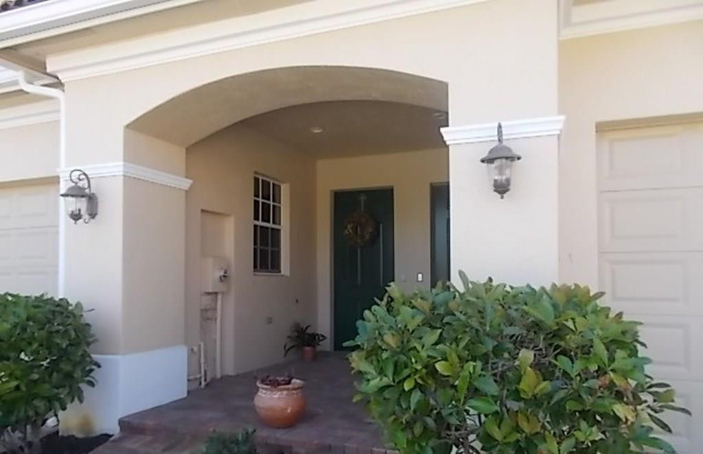 370 Southwest Walking Path, Unit 370 Stuart, FL 34997 - Photo 4 of 38 Covered entry