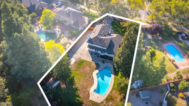 a view of an entryway with wooden floor and windows