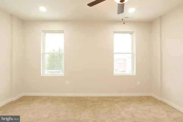 an empty room with windows
