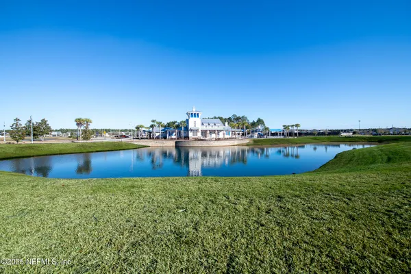 a view of a swimming pool and lake view