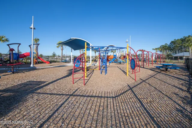 an outdoor space with lots of swings
