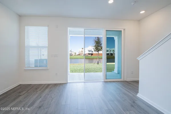 a view of a livingroom with wooden floor