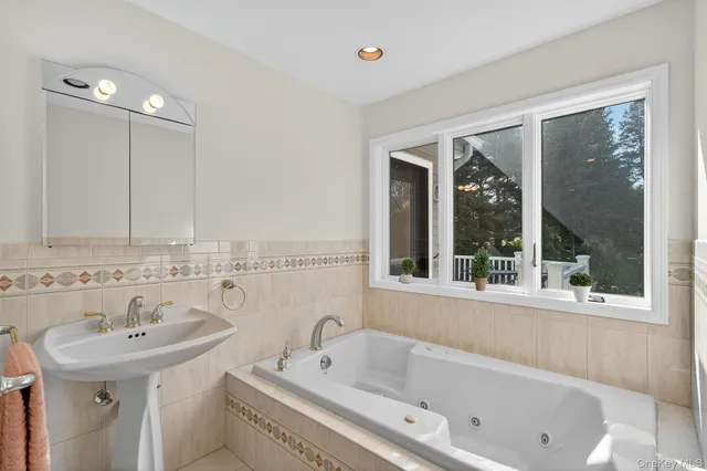 a bathroom with a sink and a bathtub