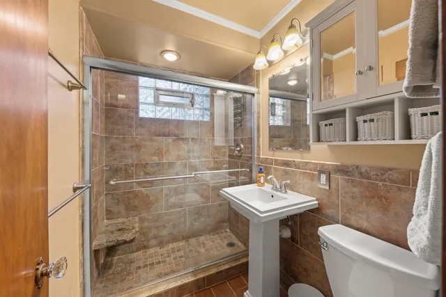 a bathroom with a sink and mirror