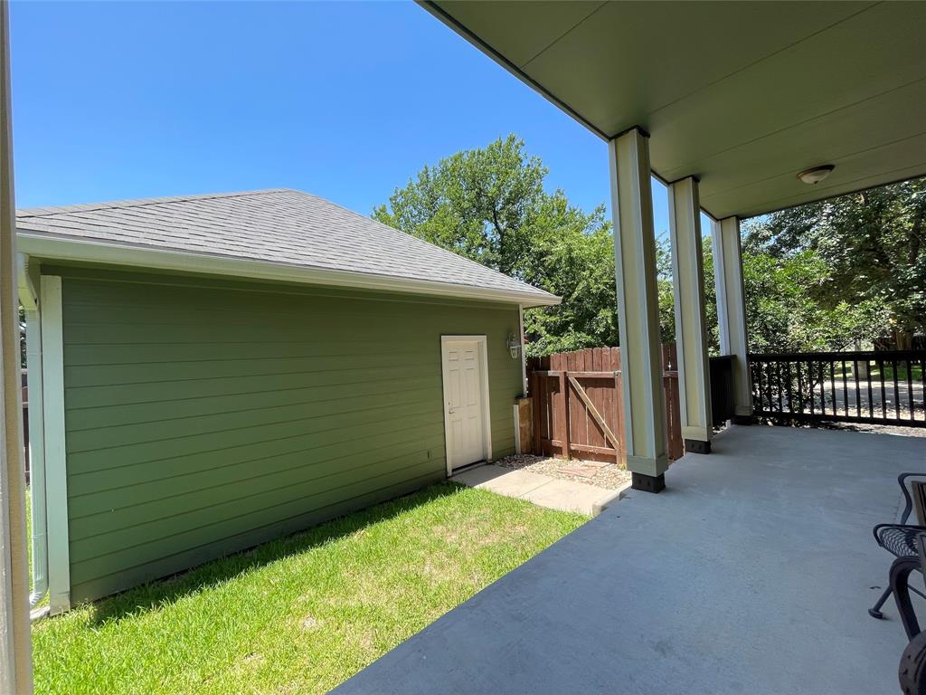 1007 Taulbee Lane, Unit B Austin, TX 78757 - Photo 35 of 36 View of patio / terrace featuring a gate
