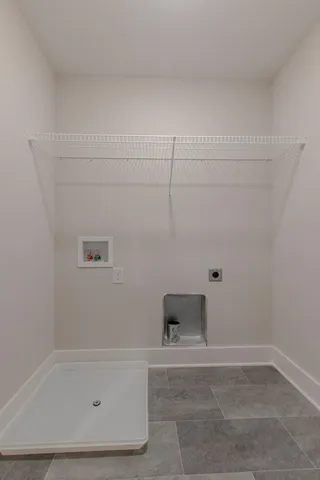 a view of a refrigerator in a bathroom