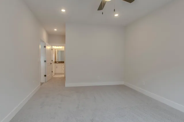 a kitchen with stainless steel appliances a stove and a microwave