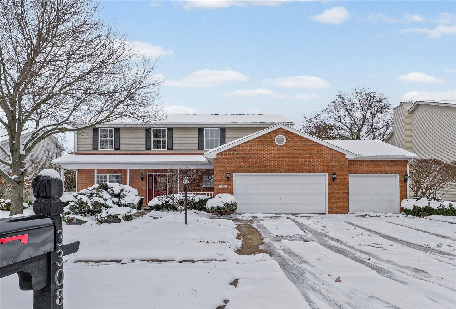 3308 Pebblecreek Place Champaign, IL 61822 - Photo 2 of 57 a front view of a house with garden