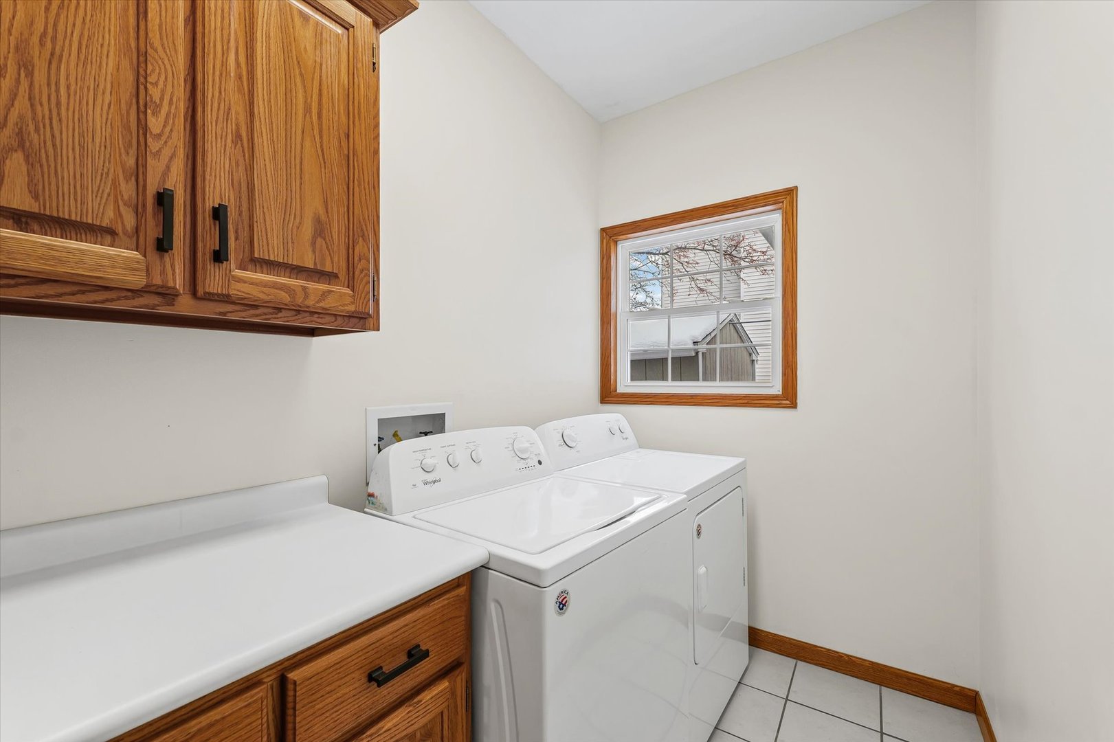 3308 Pebblecreek Place Champaign, IL 61822 - Photo 30 of 57 a utility room with dryer and washer