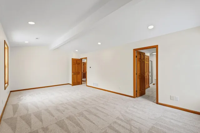 a bathroom with a tub and a shower