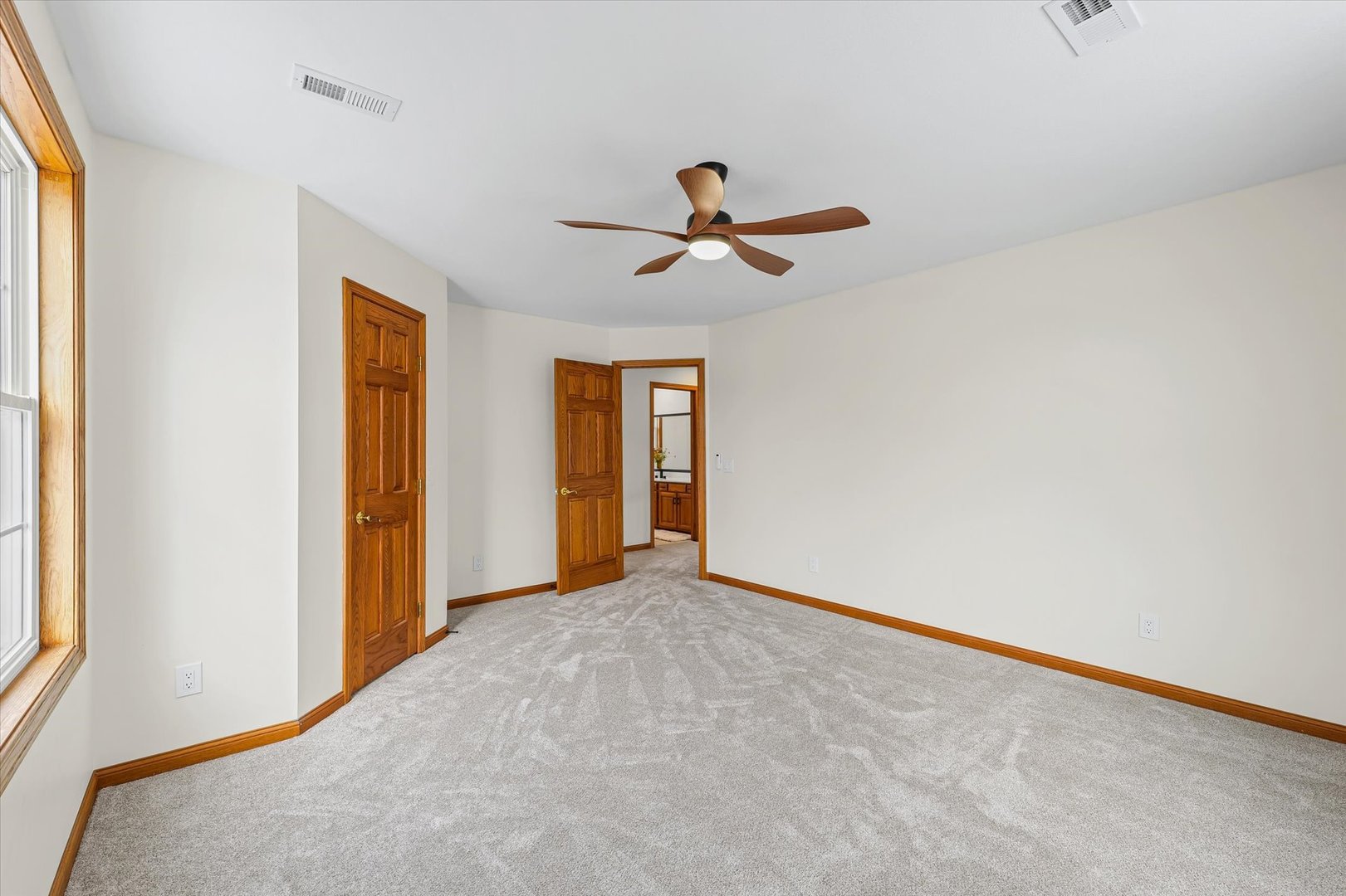 3308 Pebblecreek Place Champaign, IL 61822 - Photo 42 of 57 a view of an empty room with a window