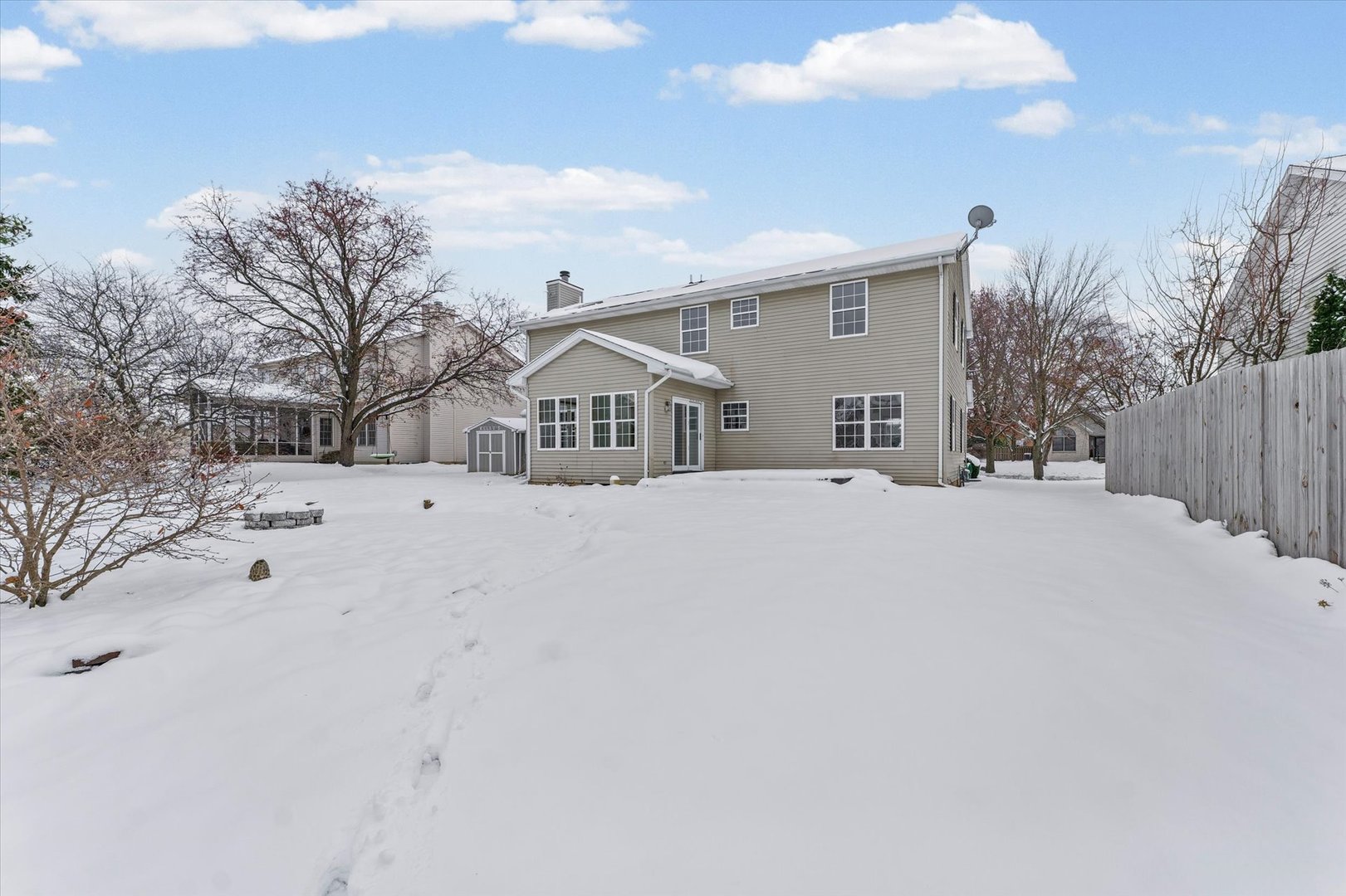 3308 Pebblecreek Place Champaign, IL 61822 - Photo 50 of 57 a view of the house with a snow in the yard