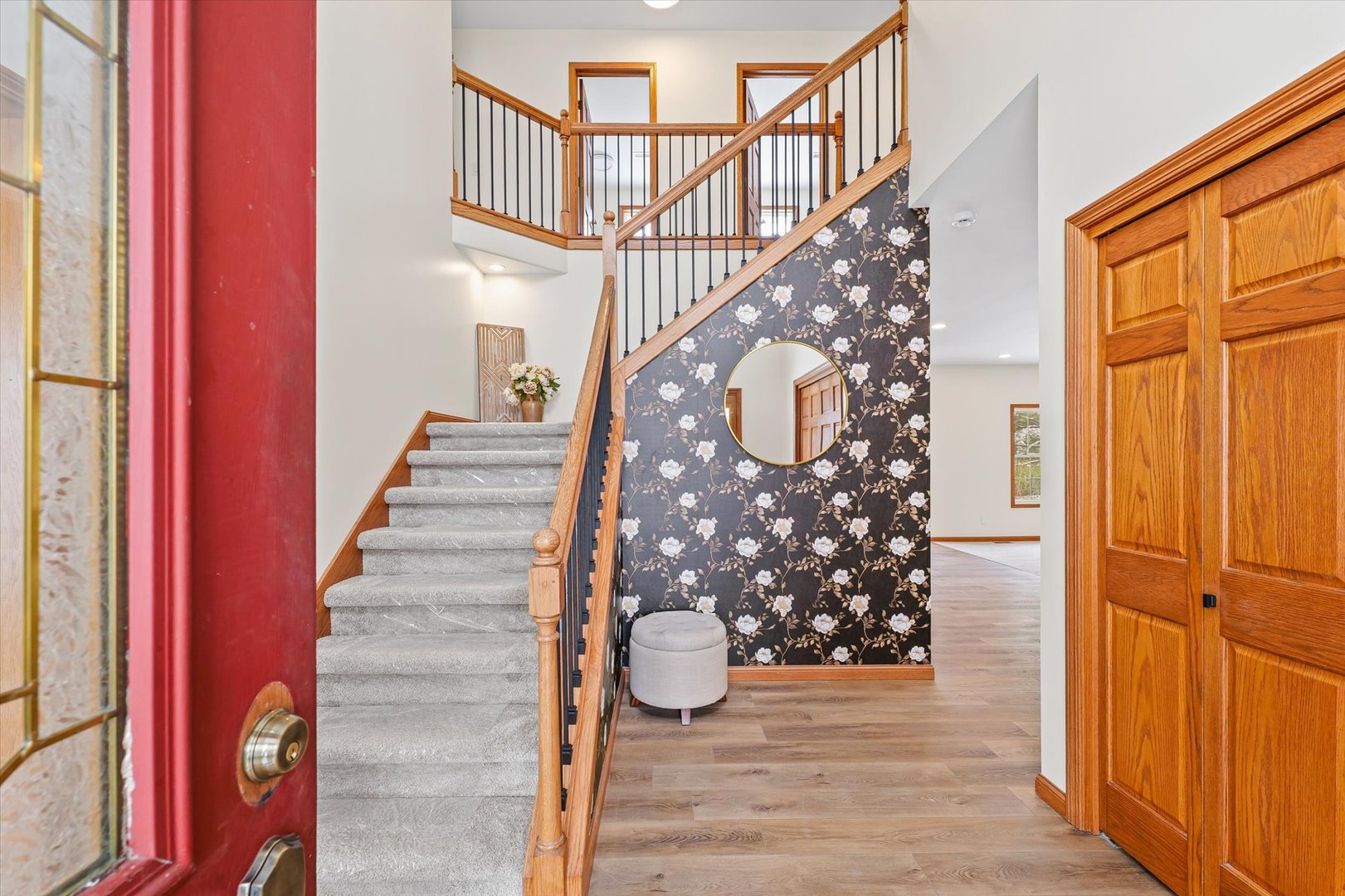 3308 Pebblecreek Place Champaign, IL 61822 - Photo 5 of 57 a view of entryway with wooden floor and stairs