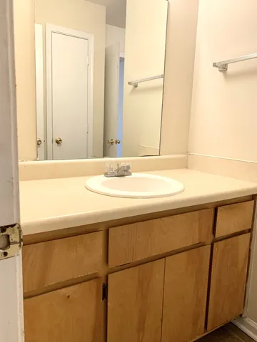 a bathroom with a shower and a shower
