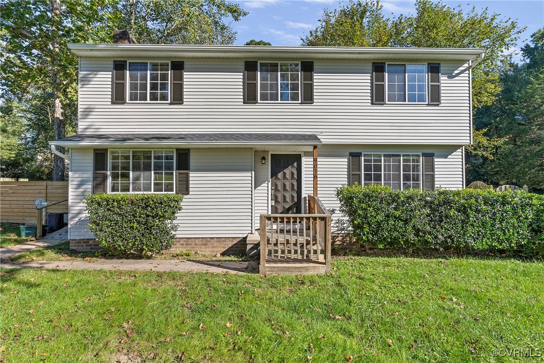 9036 Resaca Road Chesterfield, VA 23236 - Photo 1 of 39 View of front of house with a front yard, fence, a