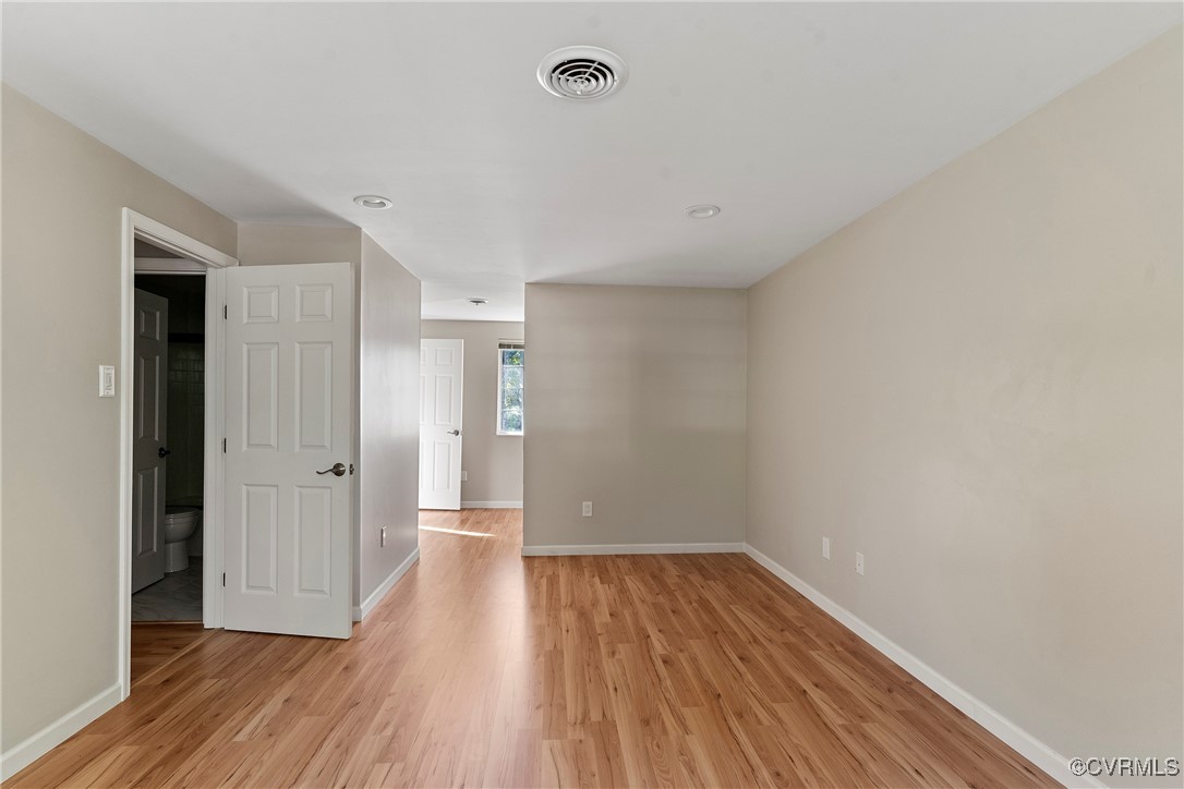 9036 Resaca Road Chesterfield, VA 23236 - Photo 17 of 39 Spare room with light wood-type flooring, visible