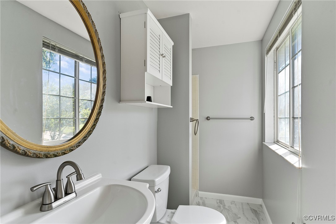 9036 Resaca Road Chesterfield, VA 23236 - Photo 19 of 39 Bathroom with a sink, baseboards, toilet, and marb