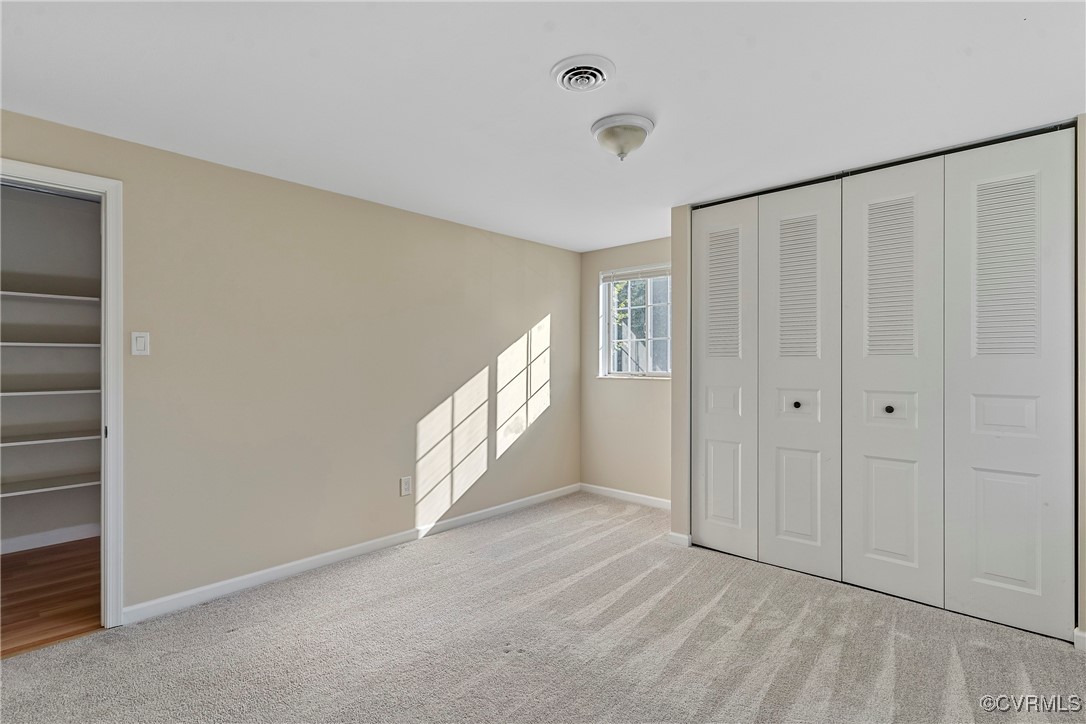 9036 Resaca Road Chesterfield, VA 23236 - Photo 22 of 39 Unfurnished bedroom featuring carpet, visible vent