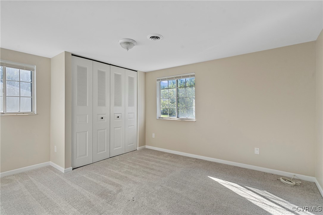9036 Resaca Road Chesterfield, VA 23236 - Photo 23 of 39 Unfurnished bedroom featuring visible vents, multi