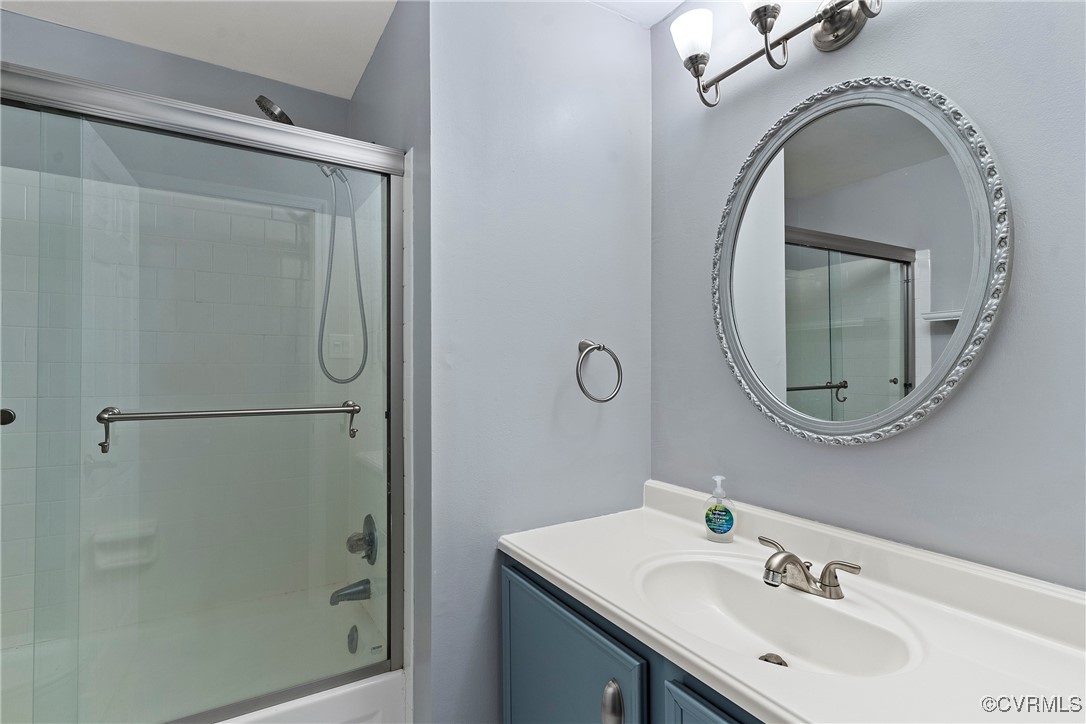 9036 Resaca Road Chesterfield, VA 23236 - Photo 26 of 39 Bathroom featuring vanity and bath / shower combo