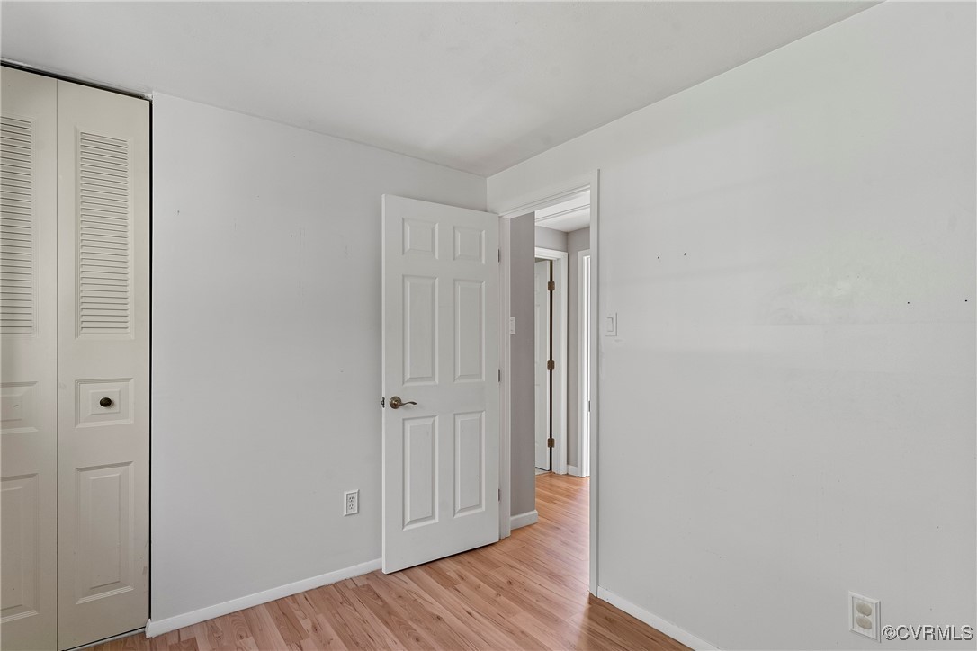 9036 Resaca Road Chesterfield, VA 23236 - Photo 28 of 39 Unfurnished bedroom with a closet, baseboards, and