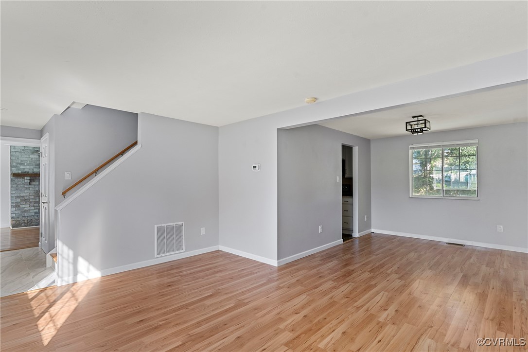9036 Resaca Road Chesterfield, VA 23236 - Photo 4 of 39 Unfurnished living room with visible vents, basebo