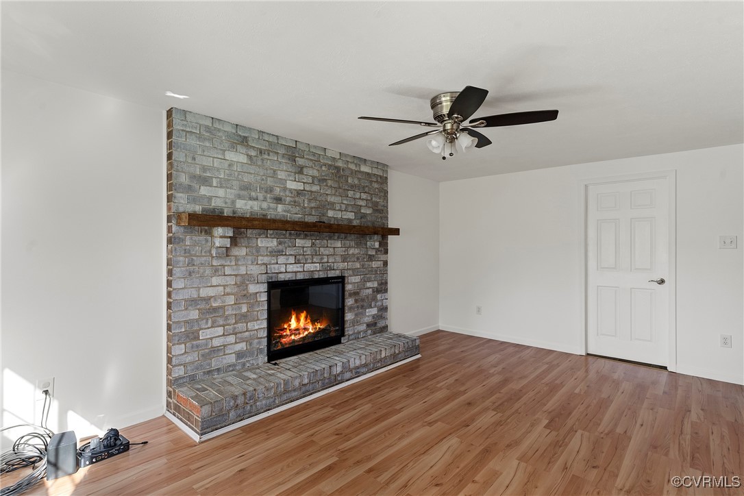 9036 Resaca Road Chesterfield, VA 23236 - Photo 8 of 39 Unfurnished living room with ceiling fan, baseboar