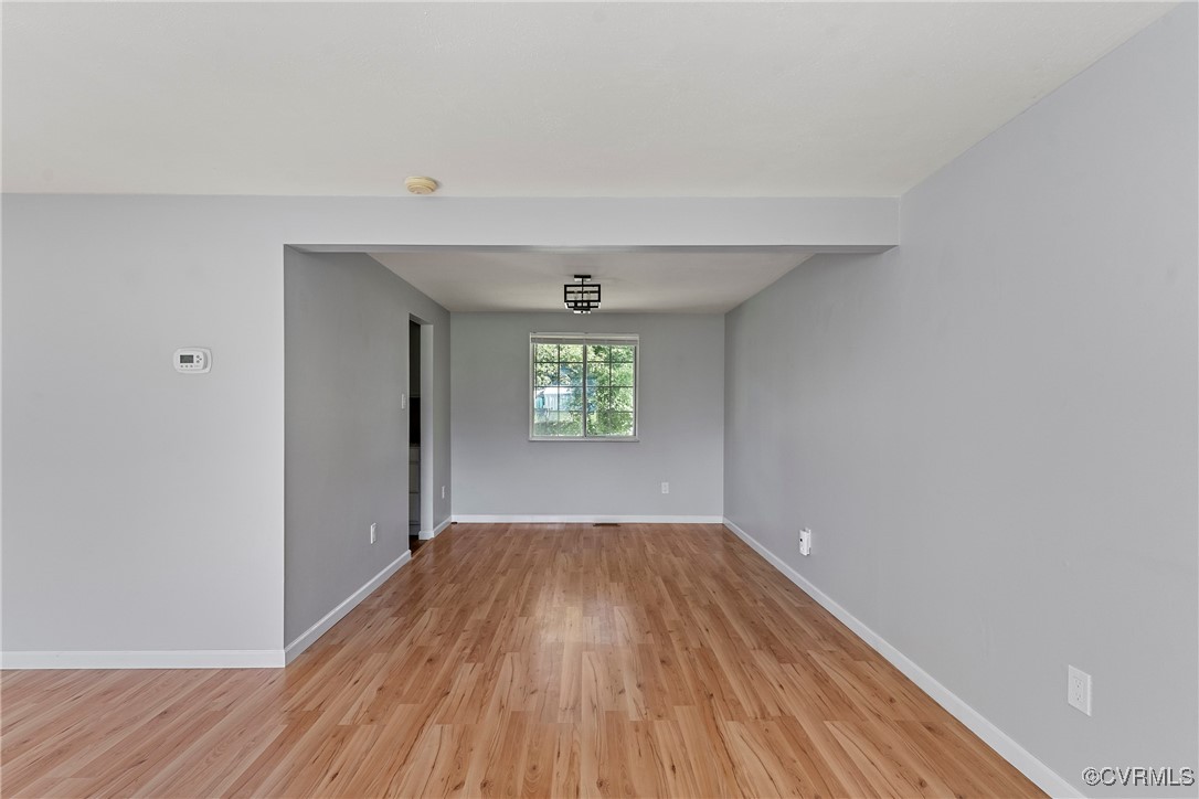 9036 Resaca Road Chesterfield, VA 23236 - Photo 10 of 39 Unfurnished room featuring light wood-style floori