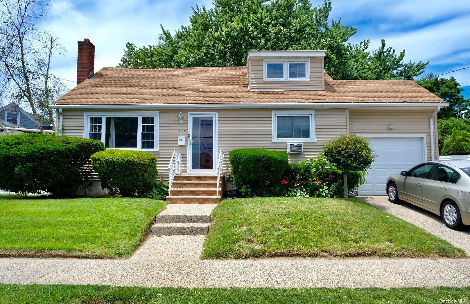 a house view with a garden space