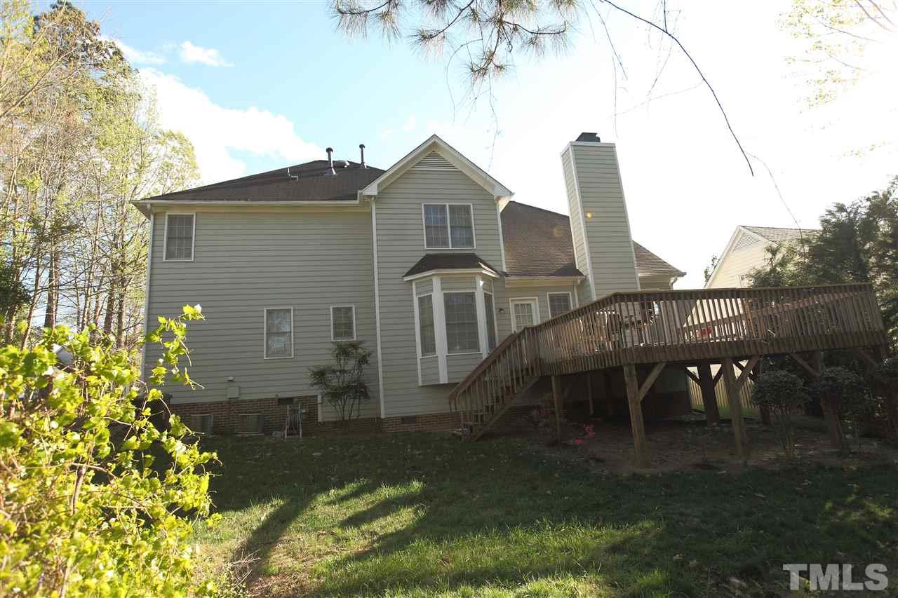 5304 Calverton Drive Raleigh, NC 27613 - Photo 22 of 22 a front view of a house with a yard