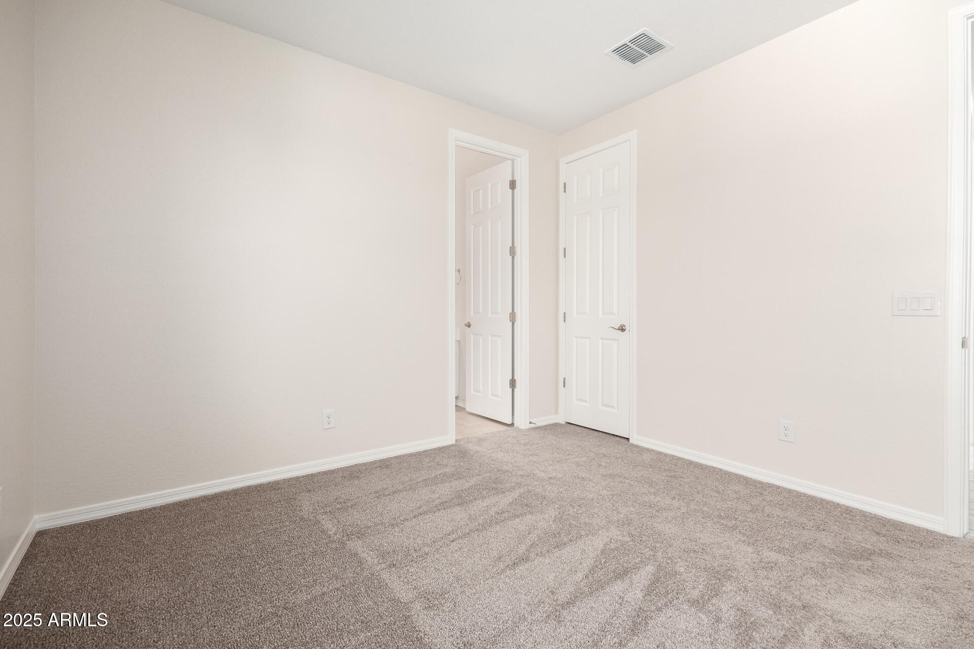 5008 West Roundhouse Road Laveen, AZ 85339 - Photo 17 of 36 a view of an empty room