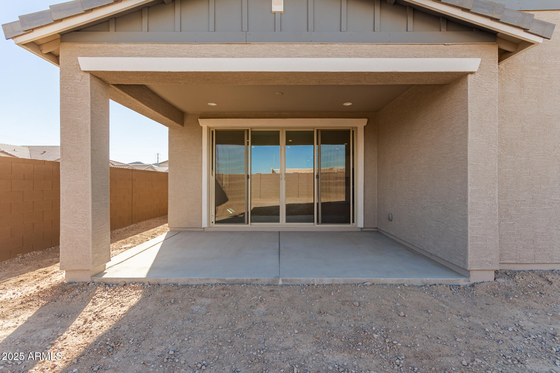 5008 West Roundhouse Road Laveen, AZ 85339 - Photo 26 of 36 a view of a house with a large window