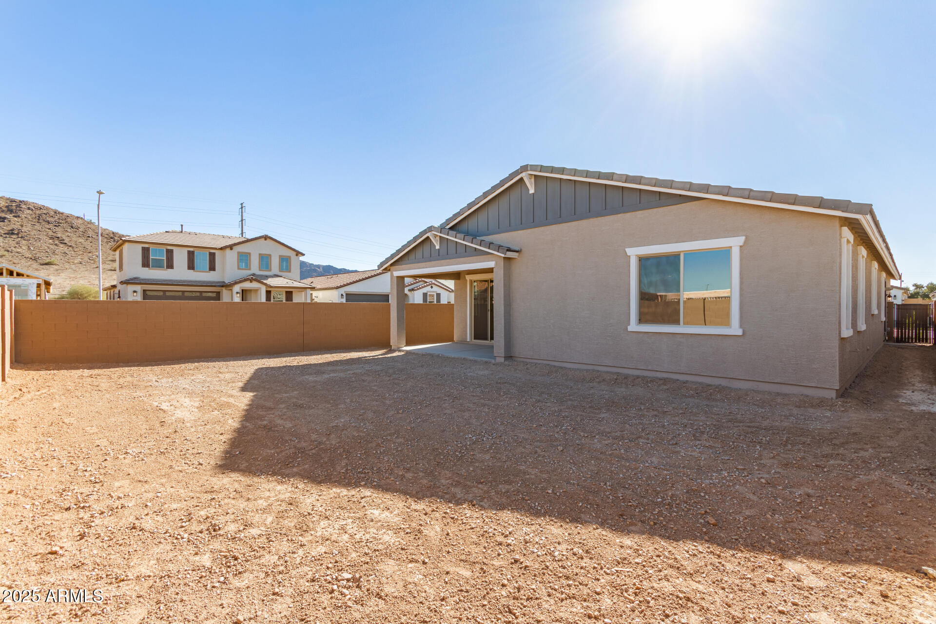 5008 West Roundhouse Road Laveen, AZ 85339 - Photo 28 of 36 a view of a house with a snow in the background