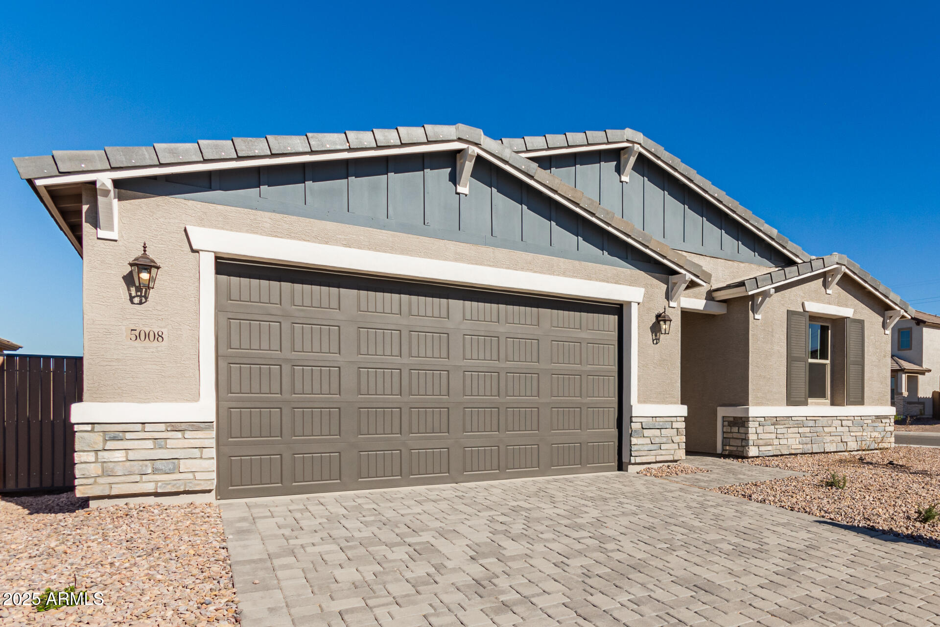 5008 West Roundhouse Road Laveen, AZ 85339 - Photo 33 of 36 a view of a house with a outdoor space