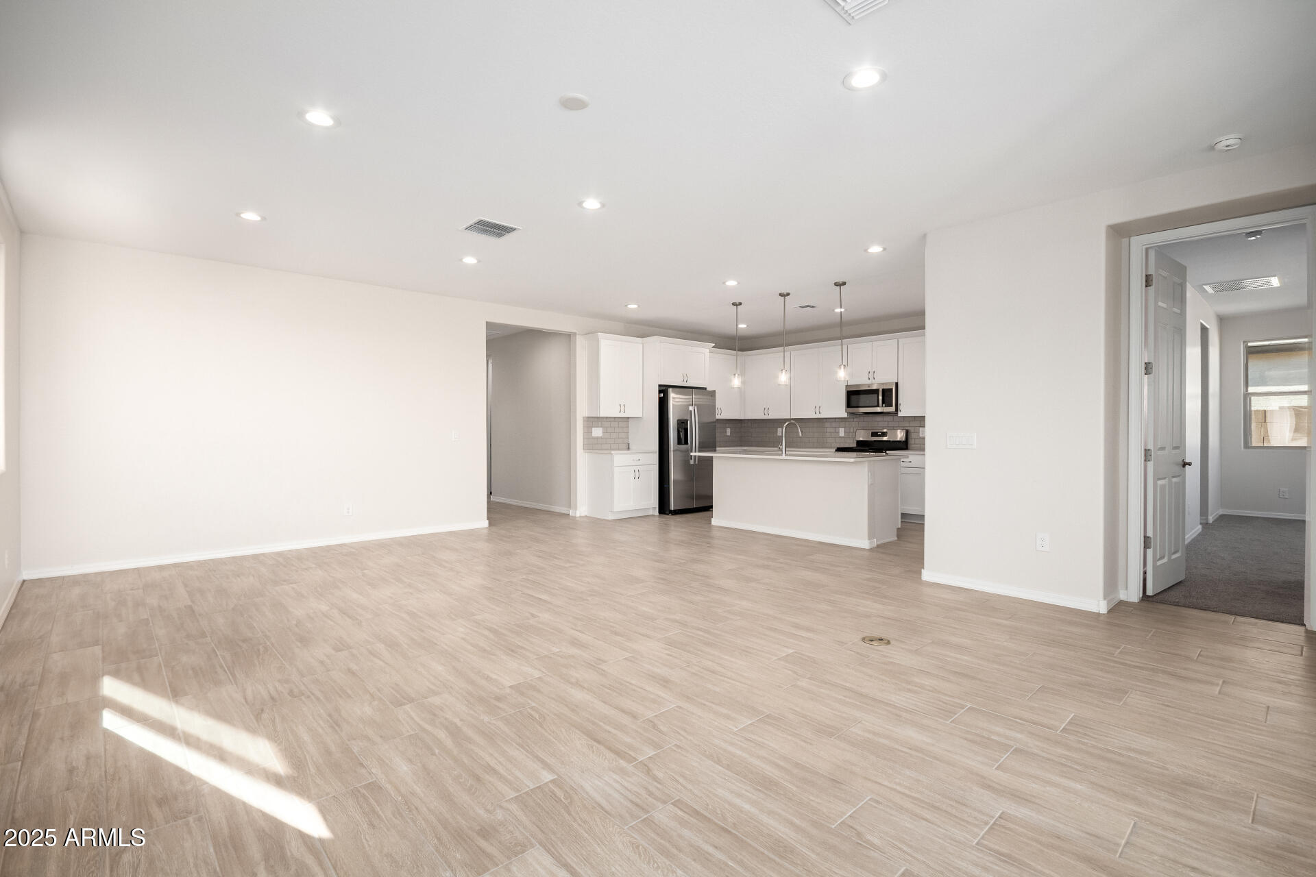 5008 West Roundhouse Road Laveen, AZ 85339 - Photo 6 of 36 a view of a kitchen with a sink
