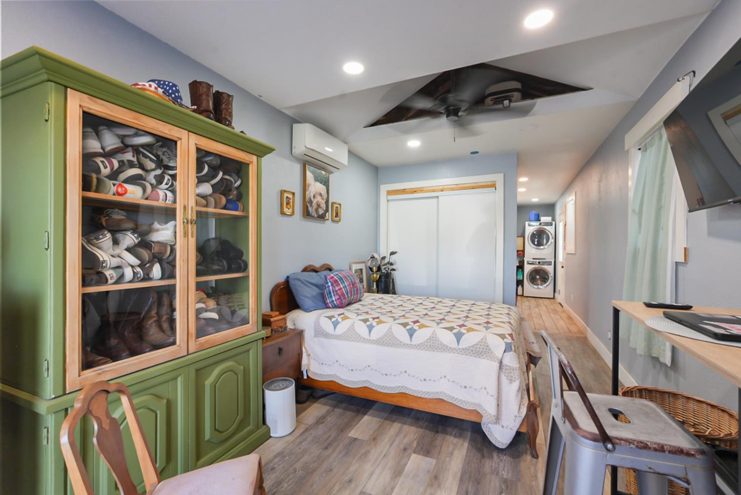 526 Flower Street Turlock, CA 95380 - Photo 12 of 28 a bedroom with a bed furniture and a window