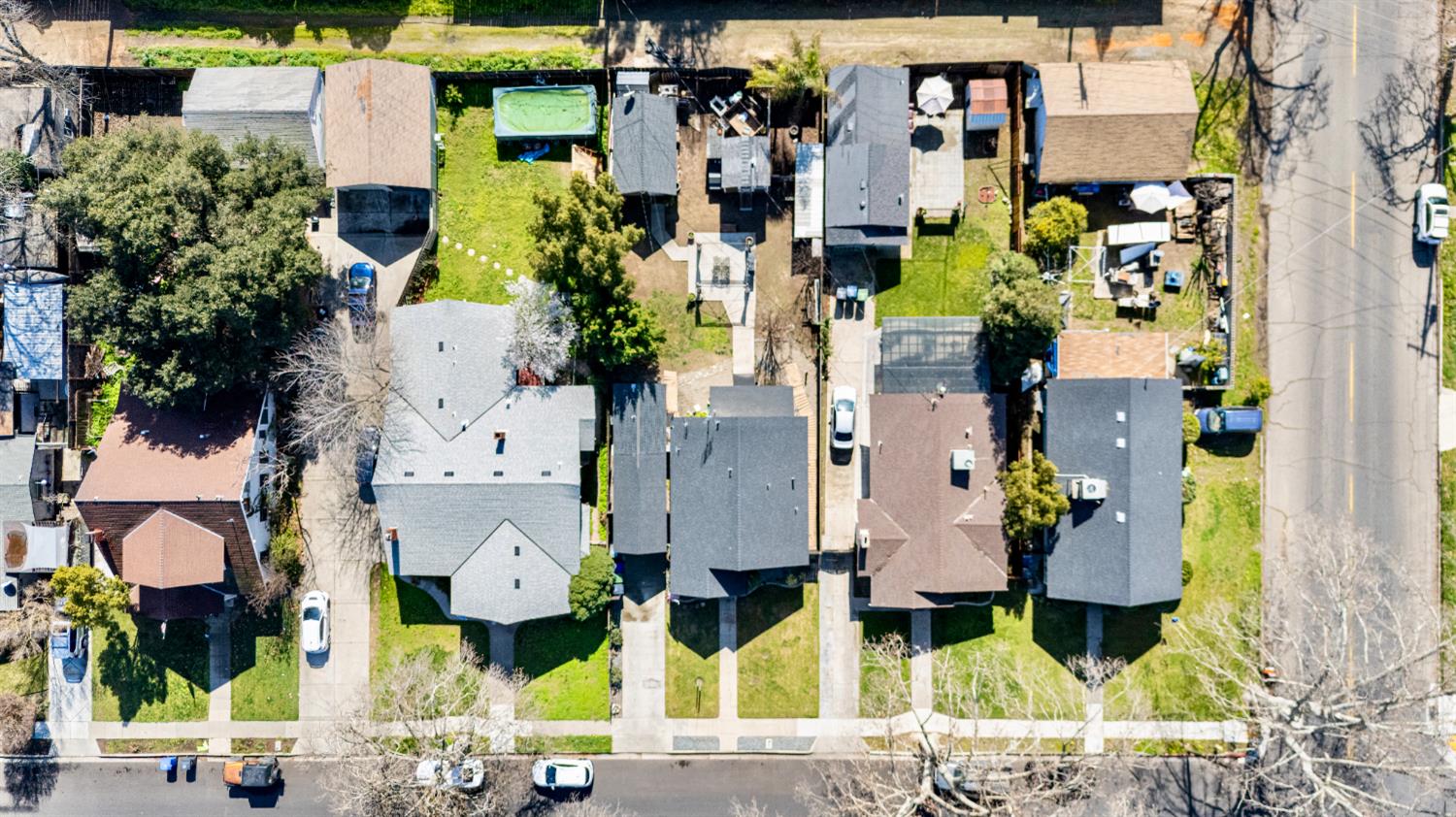 526 Flower Street Turlock, CA 95380 - Photo 21 of 28 aerial view of multi story residential apartment building with yard