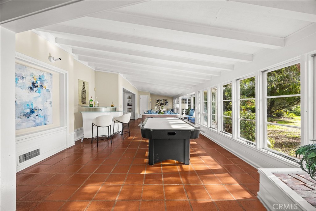 1110 Fallen Leaf Road Arcadia, CA 91006 - Photo 11 of 38 a living room with a large window wooden floor and furniture